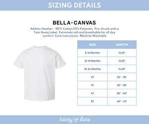 Sizing chart for Bella + Canvas clothing, detailing sizes 6-12 months, 12-18 months, 18-24 months, 2T, 3T, 4T, and 5T with corresponding length measurements.