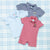 Two personalized striped polo shirts for babies: a red romper and a light blue shirt.