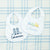 White baby bibs with delicate trim details and motif.