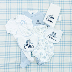 Baby gift set featuring a personalized collection for boys 