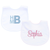 White baby bibs with delicate trim details, designed for comfort and easy cleaning.