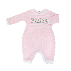 A pink baby onesie featuring long sleeves and a full-length design 