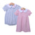 Two personalized children's dresses in different styles with peter pan collars.